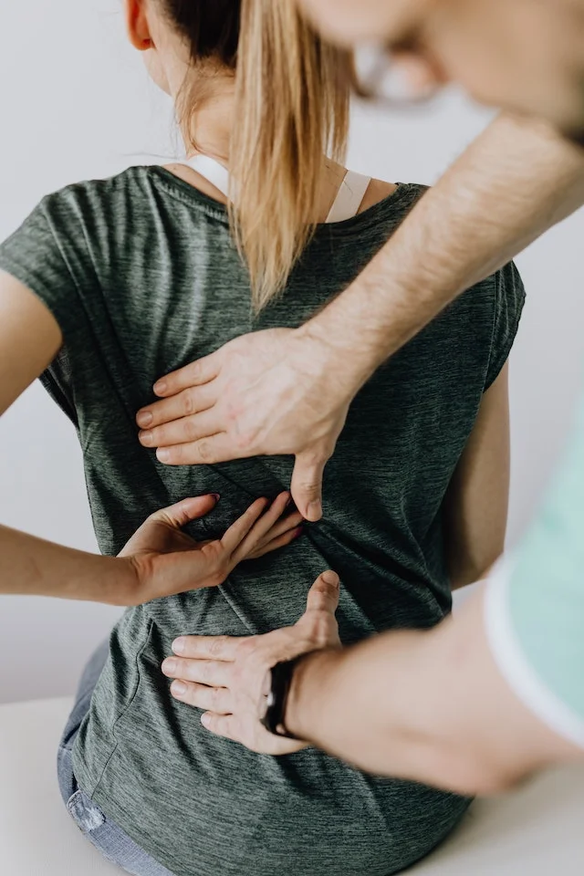 Lady with low back ache
